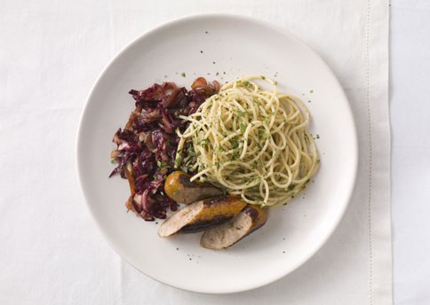 Sausages with caramelized red onions and radicchio