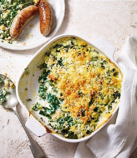 Sausages with creamy kale gratin