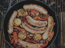 Sausages with peppers and onions