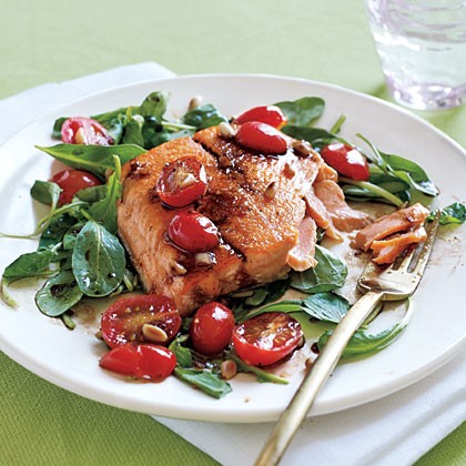 Sautéed Arctic char and arugula salad with tomato vinaigrette