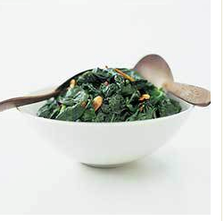 Sautéed baby spinach with almonds and golden raisins