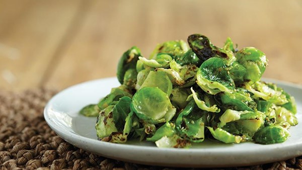 Sautéed Brussels sprouts leaves with shallots and gomasio