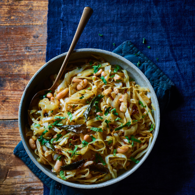 Sauteed cabbage with white beans and curry leaves