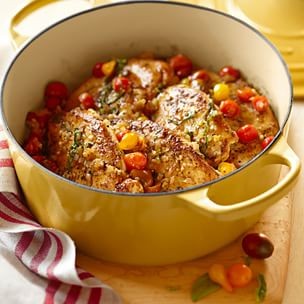 Sautéed chicken breast with warm tomato salad