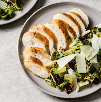 Sautéed chicken breasts with wilted salad