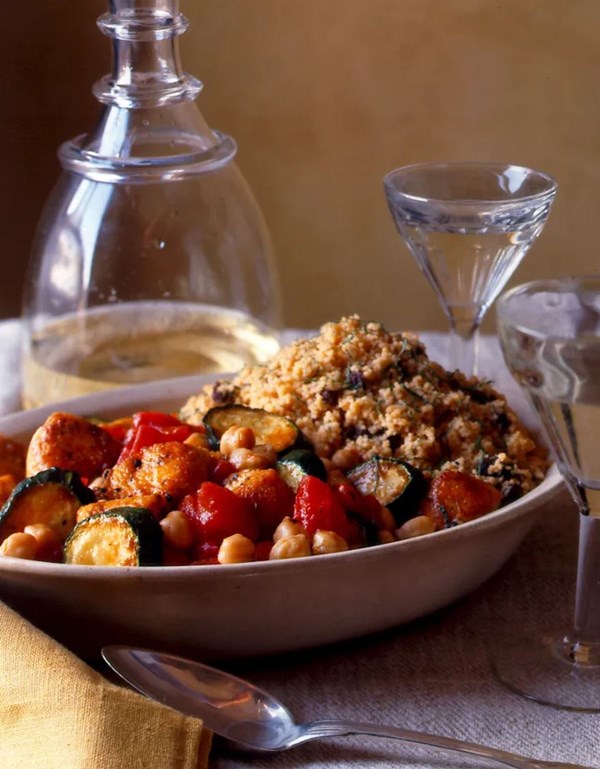 Sautéed chicken chunks with harissa and couscous