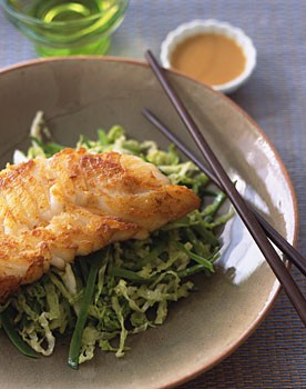 Sauteed cod on snow peas and cabbage with miso sesame vinaigrette