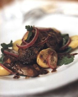 Sautéed duck livers with fenugreek & chilli on potato & coriander salad