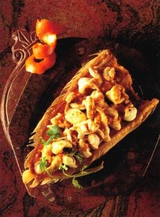 Sautéed fillet of sole with green vegetables in black bean sauce