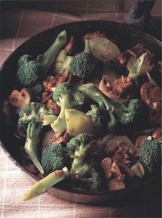Sautéed mushrooms and broccoli with garlic and coriander seeds