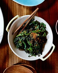 Sautéed mustard greens with crispy garlic and ginger