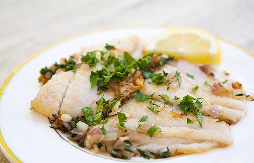 Sautéed petrale sole in herb butter sauce