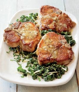 Sautéed pork chops with kale salad