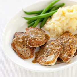 Sautéed pork cutlets with mustard-cider sauce