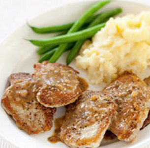 Sautéed pork cutlets with mustard-cider sauce