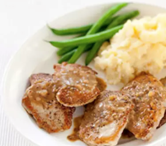 Sautéed pork cutlets with mustard-cider sauce