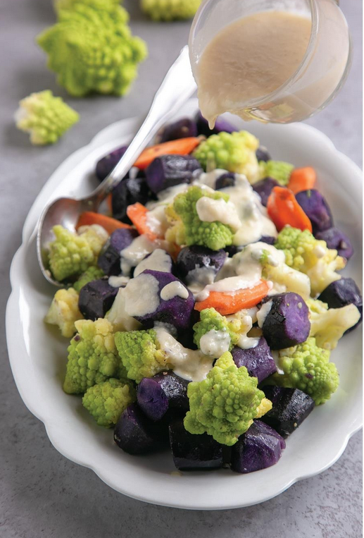 Sautéed purple potatoes and Romanesco broccoli