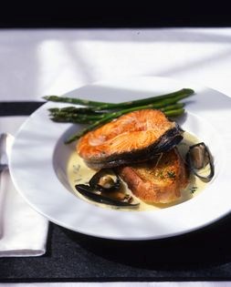 Sautéed salmon served like a bouillabaisse