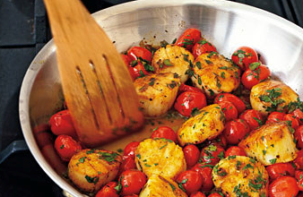 Sautéed scallops with cherry tomatoes, green onions, and parsley