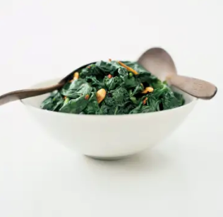 Sautéed spinach with almonds and golden raisins