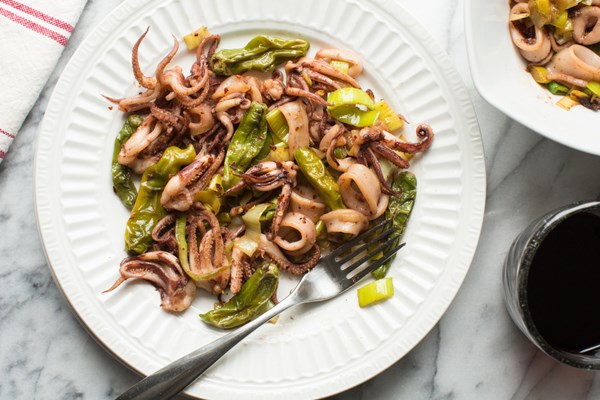 Sautéed squid with leeks and shishito peppers