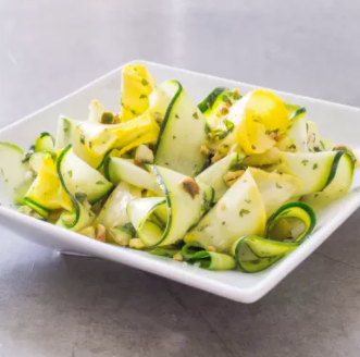 Sautéed summer squash with mint and pistachios