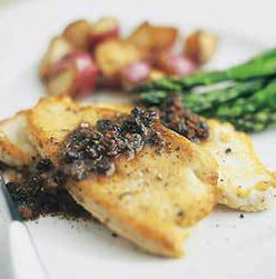 Sautéed turkey cutlets with warm-spiced currant and almond pan sauce
