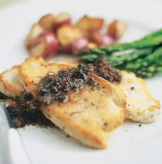 Sautéed turkey cutlets with warm-spiced currant and almond pan sauce
