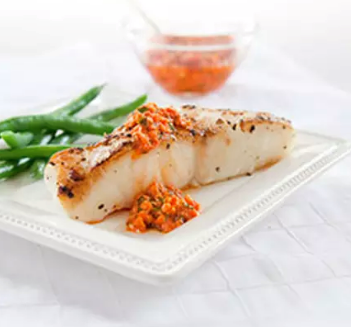Sautéed whitefish fillets with grapefruit-lime vinaigrette with mint and chives