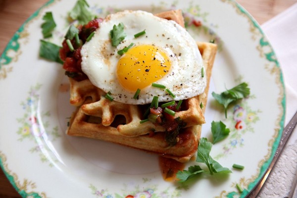 Savory cornmeal and chive waffles with salsa and eggs
