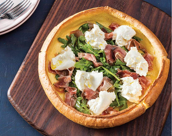 Savory Dutch baby with burrata and prosciutto