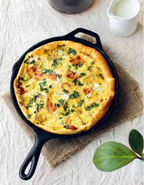 Savory Dutch baby with leeks, pancetta, and goat cheese