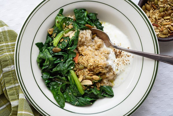 Savory oatmeal with greens and yogurt