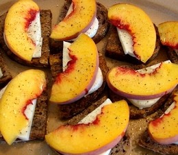 Savory peach and mozzarella fresca bruschetta on walnut bread