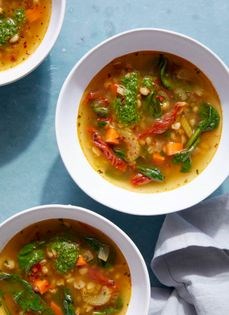 Savory winter wheat soup with herbs