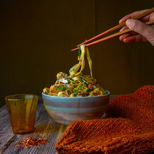 Savoy cabbage, roasted cauliflower and cashew chilli noodles (Mi xào chay)