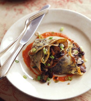 Scallion wild rice crepes with mushroom filling and red pepper sauce
