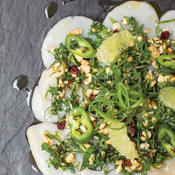 Scallop carpaccio with ‘Thai-bouleh’ cashew and lime tabbouleh
