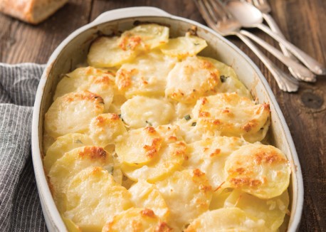 Scalloped potatoes with coconut milk and basil