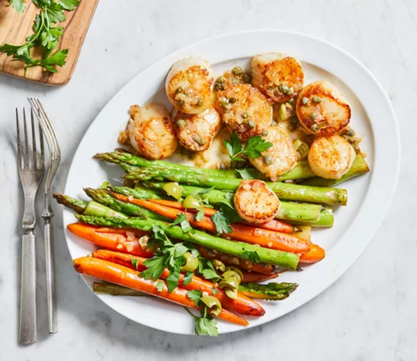Scallops & spring vegetables with olive-caper pan sauce