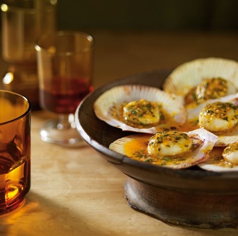 Scallops barbecued in the shell with chipotle chilli & coriander butter