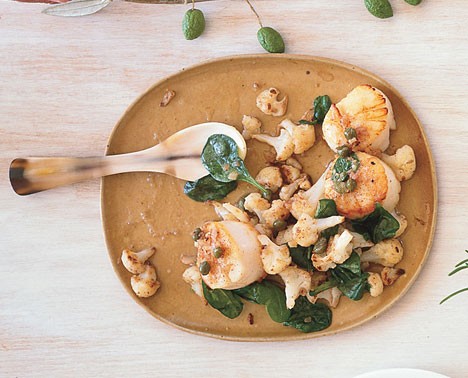 Scallops with cauliflower, dried cherries, and capers