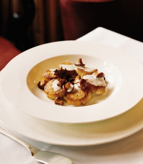 Scallops with confit potatoes and a ginger and thyme velouté