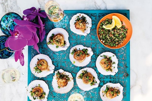 Scallops with cumin butter, chilli, peas and almonds