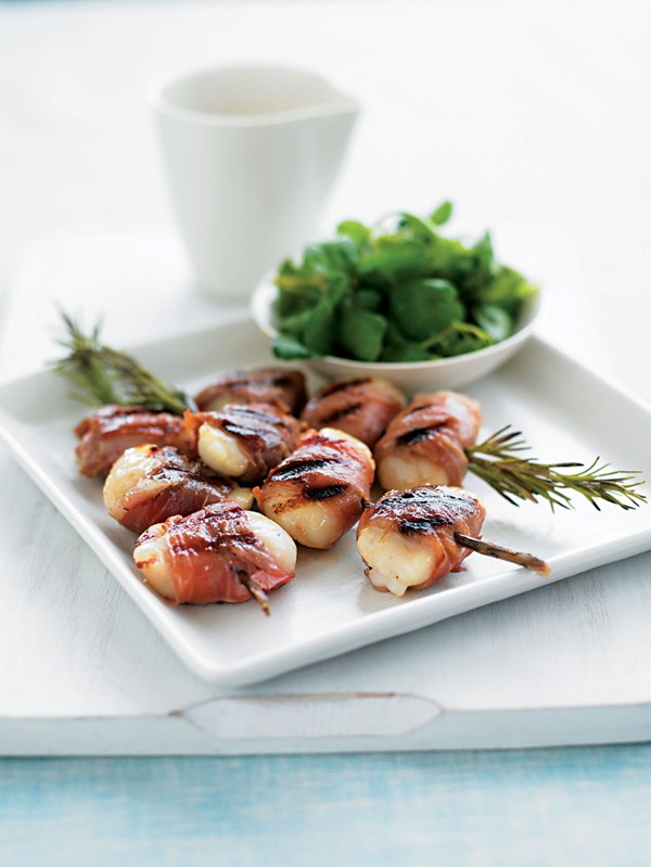 Scallops wrapped in Parma ham