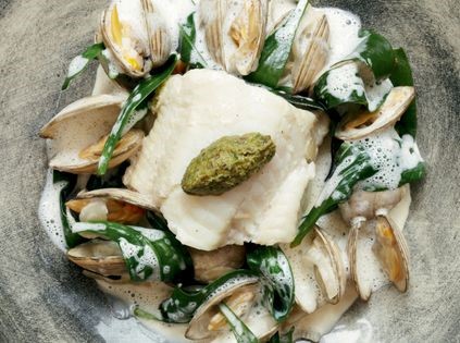 Scarborough woof with clams (Cider-poached fillet of Scarborough woof with clams, wilted sea spinach, caper and raisin purée)