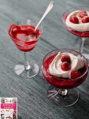 Scarlet rose and berry pudding with whipped cream