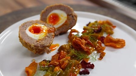 Scotch egg with homemade vegetable crisps