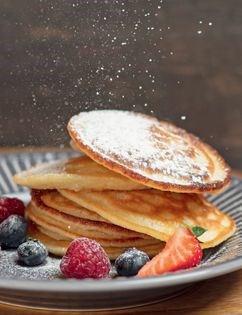 Scotch pancakes with blueberries & honey