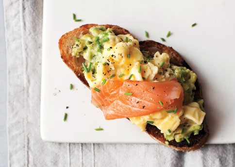Scrambled eggs, avocado, and smoked salmon on toast
